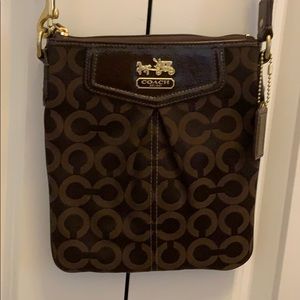Brown coach bag with change purse.